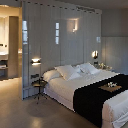 Caro Hotel Валенсия Экстерьер фото A room at the hotel