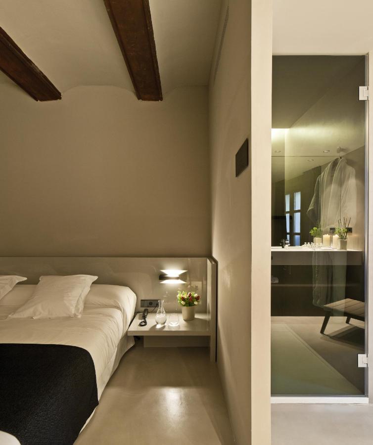Caro Hotel Валенсия Экстерьер фото A room at the hotel