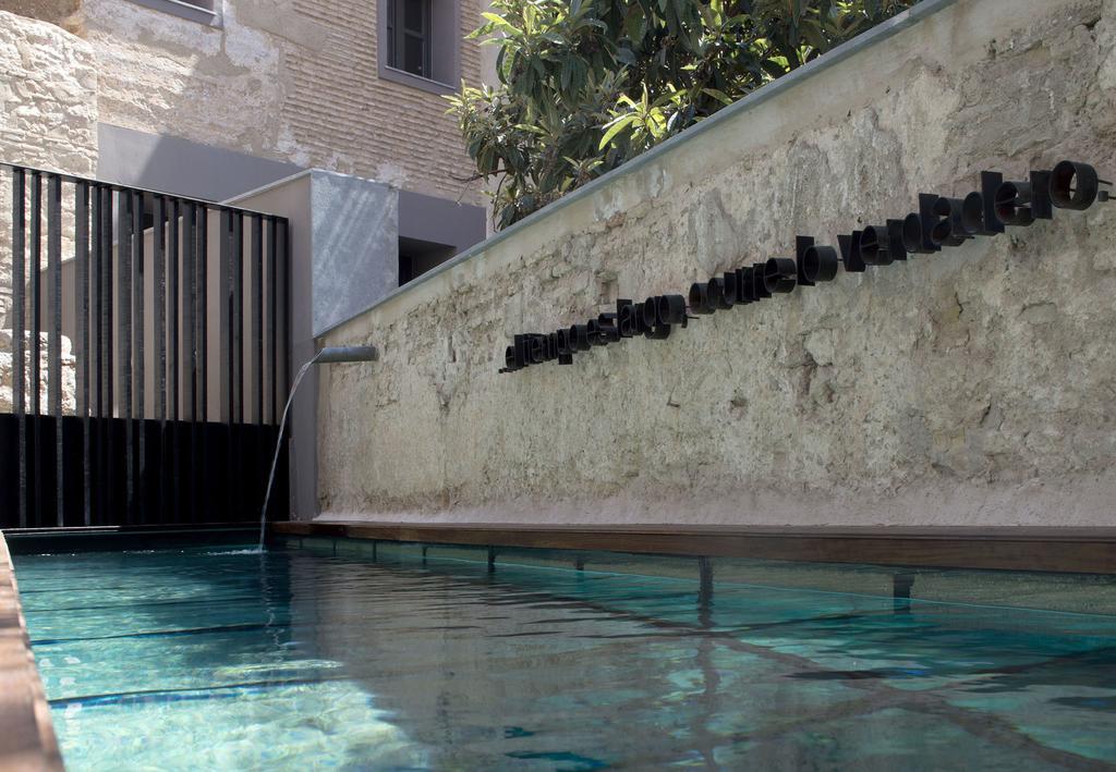 Caro Hotel Валенсия Экстерьер фото The swimming pool