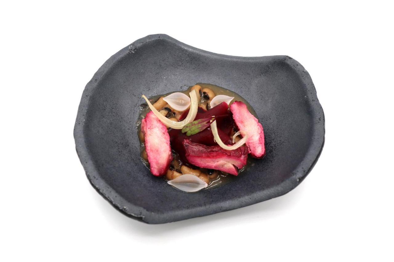 Caro Hotel Валенсия Экстерьер фото A plate of octopus sashimi